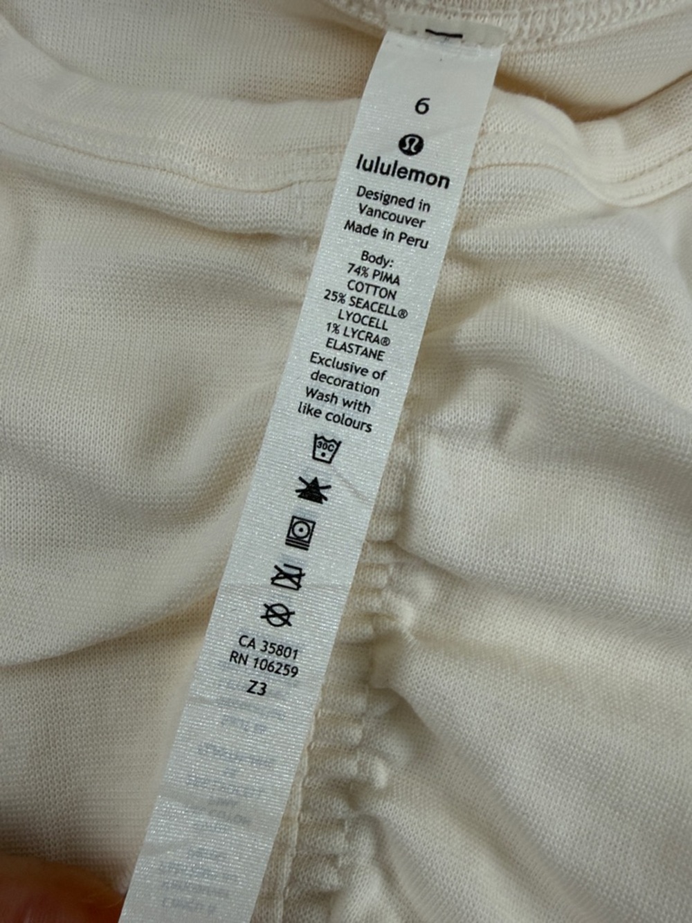 lululemon athletica Cream Ruched Center Long Sleeve Crop Top - Picture 2 of 12